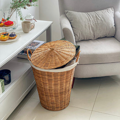 Storage basket with lid for sofa pillows, unused furniture in the living room