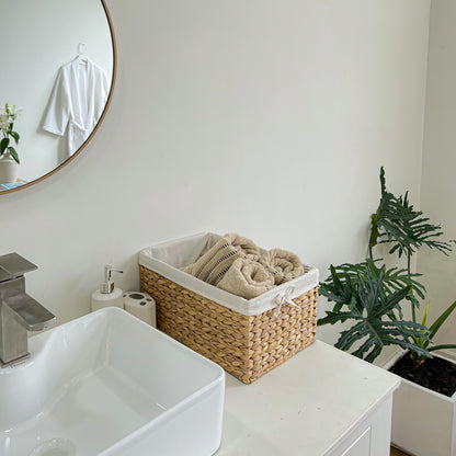 Baskets for towels and toiletries in the bathroom