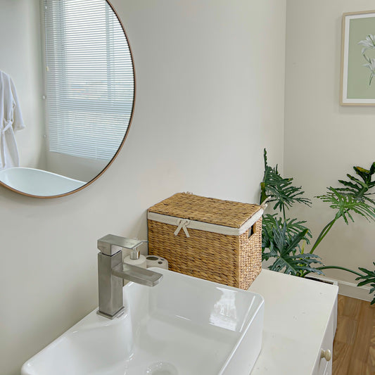 Baskets for towels and toiletries in the bathroom
